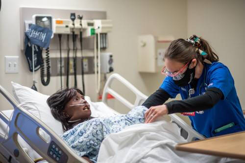 Student with manikin